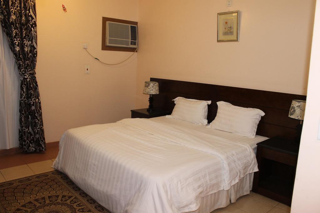 Al Narjes Suites Jizan Quarto foto